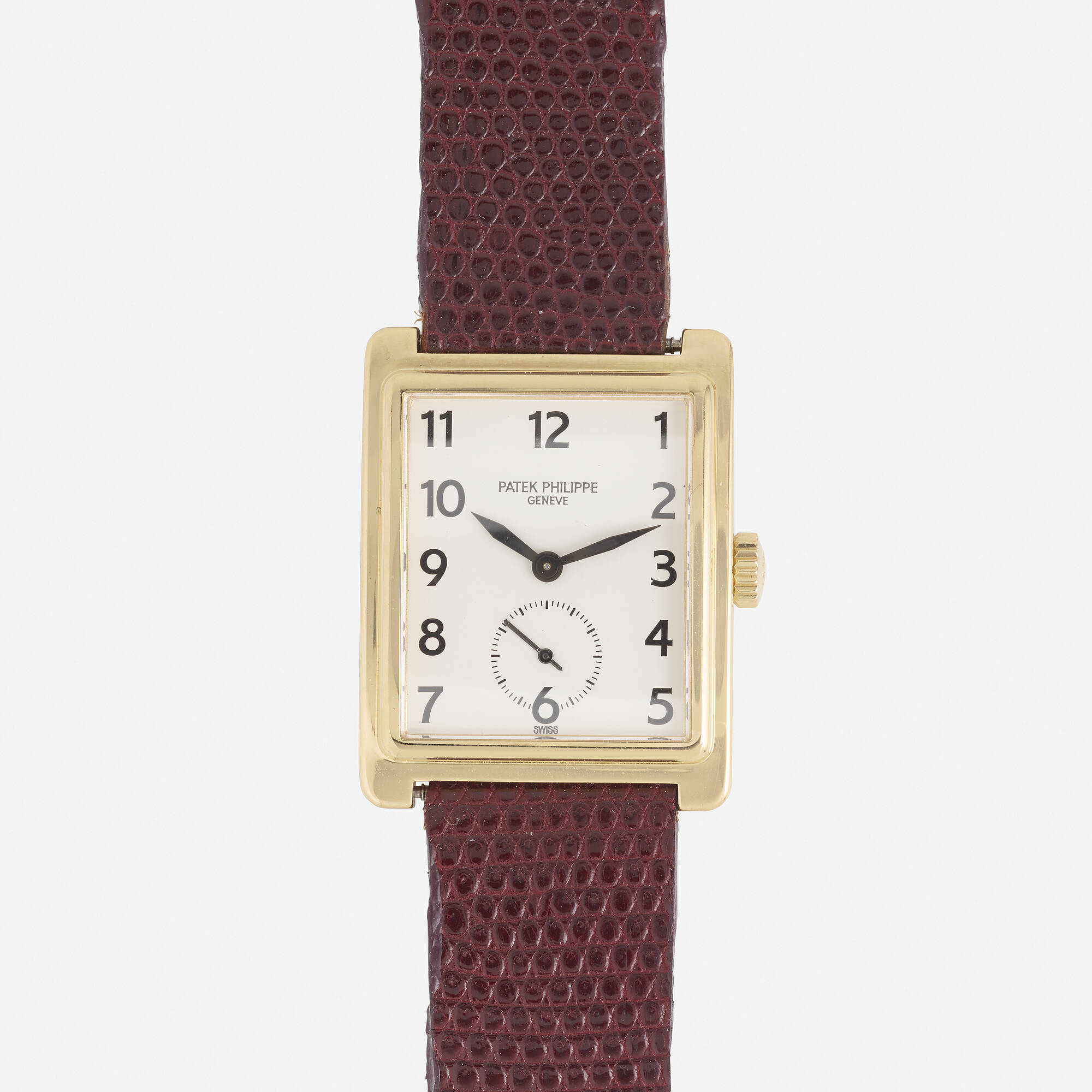 Sold at Auction: PATEK PHILIPPE, PATEK PHILIPPE A burgundy leather